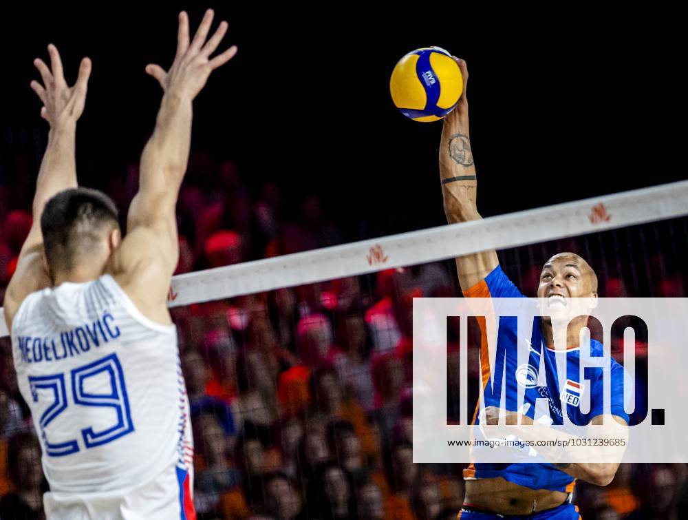KW25 ROTTERDAM - Nimir Abdel-Aziz of the Netherlands in action against Aleksander Nedeljkovic of Serbia during the Nations League volleyball match between the Netherlands and Serbia. ANP SEM VAN DER WAL ANPxSportx IVx 472430538 originalFilename: 472430538