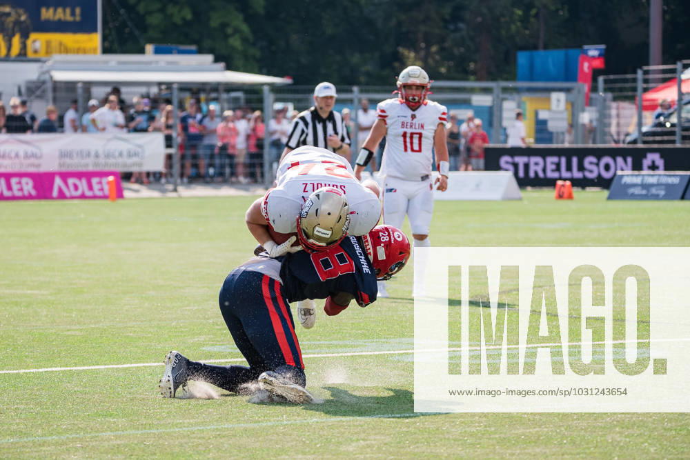 American Football, 2023 season, European League of Football ELF , Hamburg Sea Devils Berlin Thunder, Stadion Hoheluft Hamburg , 25 06 2023, 4 Gameweek Barry Maruschke 28, Sea Devils, DB, GER tackles Tim Schulz 24, Berlin Thunder, RB deep and throws him on his back For editorial use only Photo IMAGO Lobeca Roberto Seidel Hamburg Stadion Hoheluft, Lokstedter Steindamm 87 Hamburg Germany.