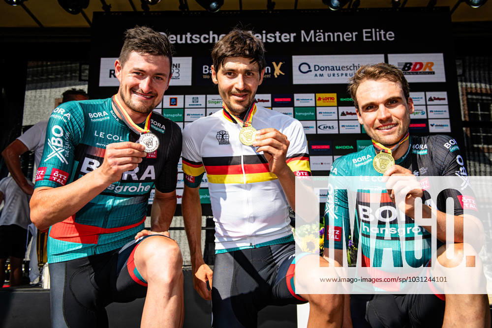 DENZ Nico, BUCHMANN Emanuel, SCHACHMANN Maximilian National Championships Road Cycling 2023 RR Elite Men DENZ Nico GER Second Place BUCHMANN Emanuel GER Winner First Place SCHACHMANN Maximilian GER Third Place BORA HANSGROHE BOH GER Award Ceremony Medal Ceremony Podium Landscape Event National Championships Road Cycling Category Category Cycling Road Cycling Elite Men Location Location Europe Germany Baden Württemberg Start Donaueschingen Finish Bad Dürrheim Baden Württemberg Discipline Road Race RR National Championships Distance 215 km Date Date 25 06 2023 Sunday