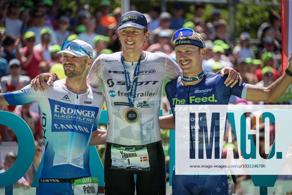 Challenge Roth Triathlon 25 06 23 The podium of the Challenge Roth 2023 from left Patrick Lange place 2 , Magnus Ditlev place 1 , Ben Kanute place 3 Roth Bavaria Germany IKT_0721