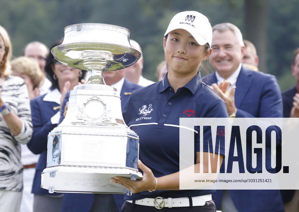 Yin Ruoning of China celebrates on the 18th green with the championship trophy in the final round after winning the KPMG Women s PGA, Golf Herren Championship with a score of 8 under par at Baltusrol Golf Club in Springfield, NJ on Sunday, June 25, 2023. NYP20230625104 JohnxAngelillo