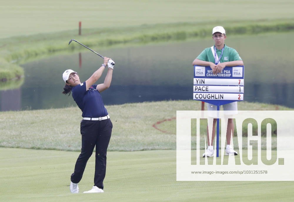 Yin Ruoning of China hits her approach shot to the 18th green in the final round before winning the KPMG Women s PGA, Golf Herren Championship with a score of 8 under par at Baltusrol Golf Club in Springfield, NJ on Sunday, June 25, 2023. NYP20230625111 JohnxAngelillo