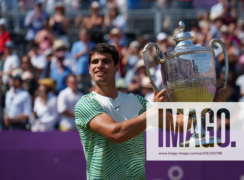KW25 Carlos Alcaraz (SPA) poses with the winners trophy after his mens single tournament win during the Finals day of the LTA cinch championships tennis tournament 2023, ATP, Tennis Herren 500 event at The Queen s Club, London, England on the 20 June 2023.