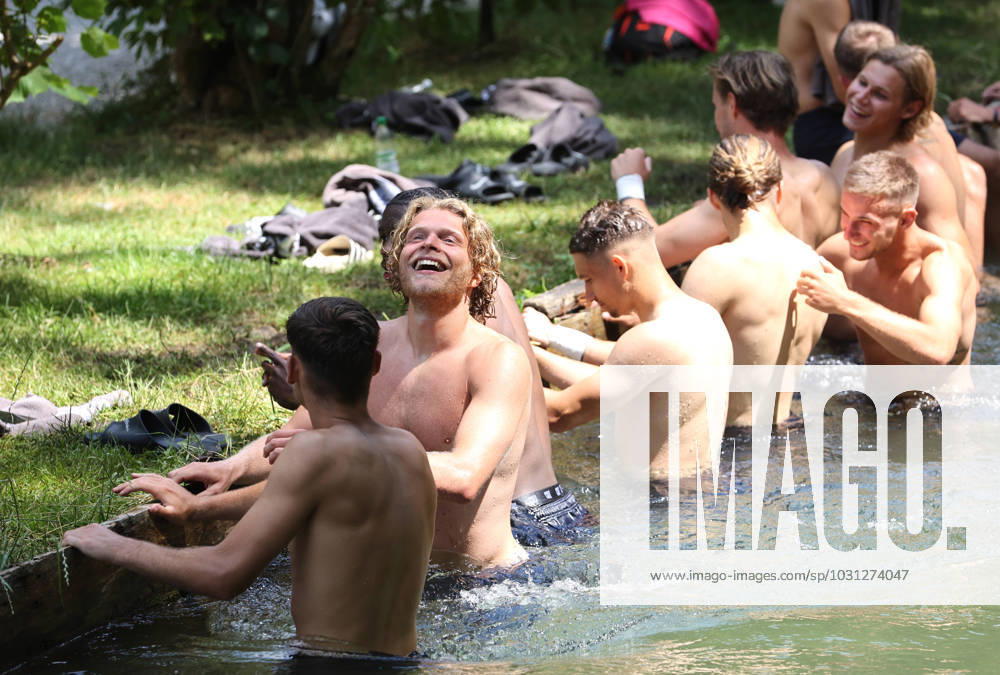 Munich, Germany 26 June 2023 football, men, 3 league, season 2023 2024, TSV 1860 Munich, cooling off at the Auer Mühlbach, Grünwalder Strasse 114 After training, the players of TSV 1860 Munich cool off at the Auer Mühlbach, take a bath, as here Jesper Verlaat TSV 1860 Munich
