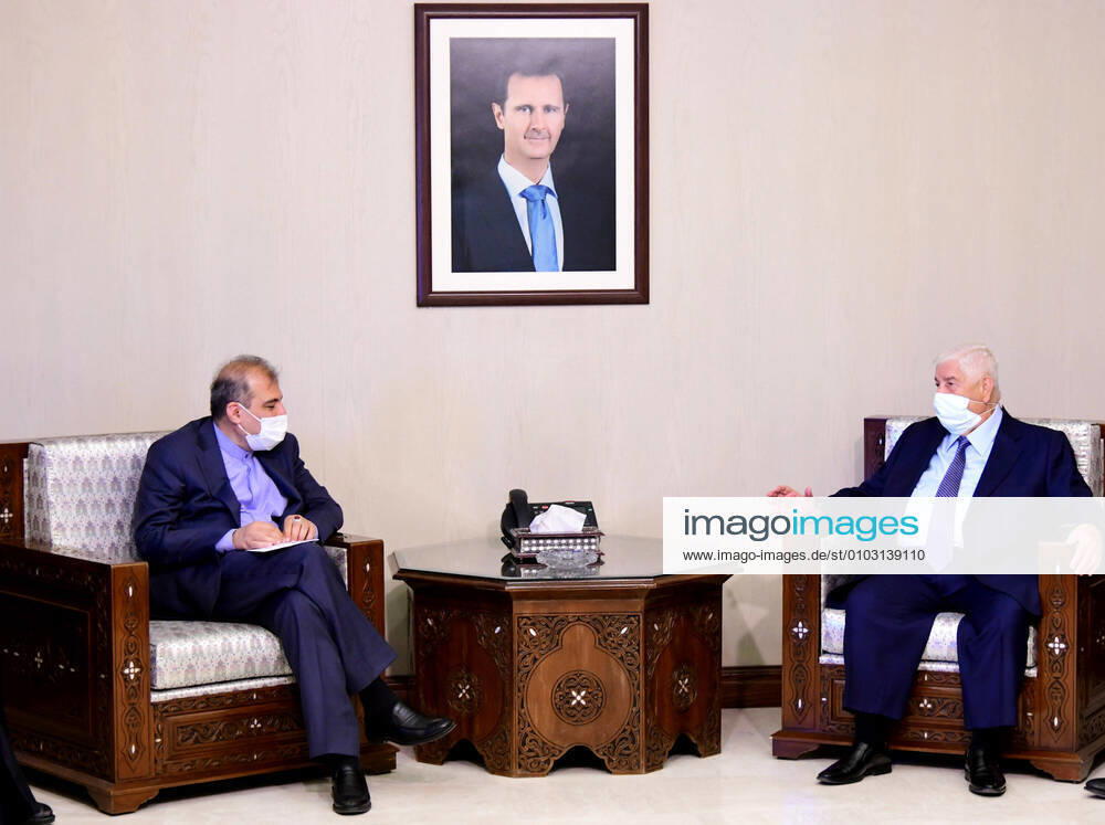 (200817) -- DAMASCUS, Aug. 17, 2020 -- Syrian Foreign Minister Walid al-Moallem (R) meets with visiting Ali Asghar Khaji, senior assistant to the Iranian foreign minister, in Damascus, capital of Syria, on Aug. 17, 2020. The two officials highlighted on Monday the rapid development in the strategic relations between the two countries. (Photo by Xinhua) SYRIA-DAMASCUS-IRAN-VISIT AmmarxSafarjalani