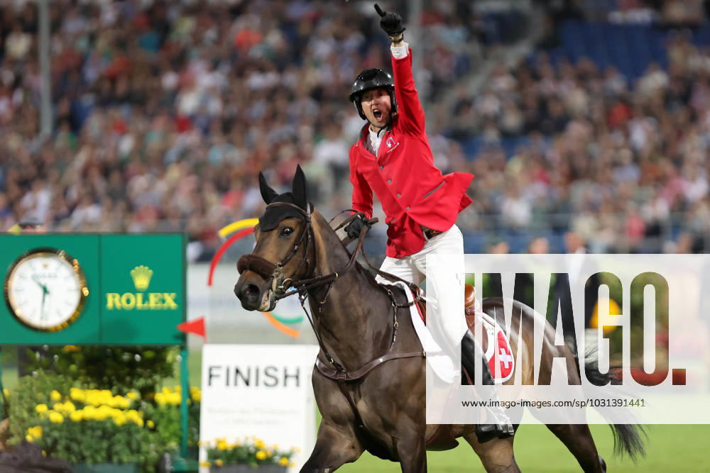 1 place for Switzerland, Martin Fuchs SUI with horse Commissar Pezi cheers to victory, emotions , Mercedes Benz Nations Cup, Team Jumping Competition with two rounds under floodlights , World Equestrian Festival, CHIO Aachen 2023, 23 06 02 07 2023, Aachen Soers, 29 06 2023,
