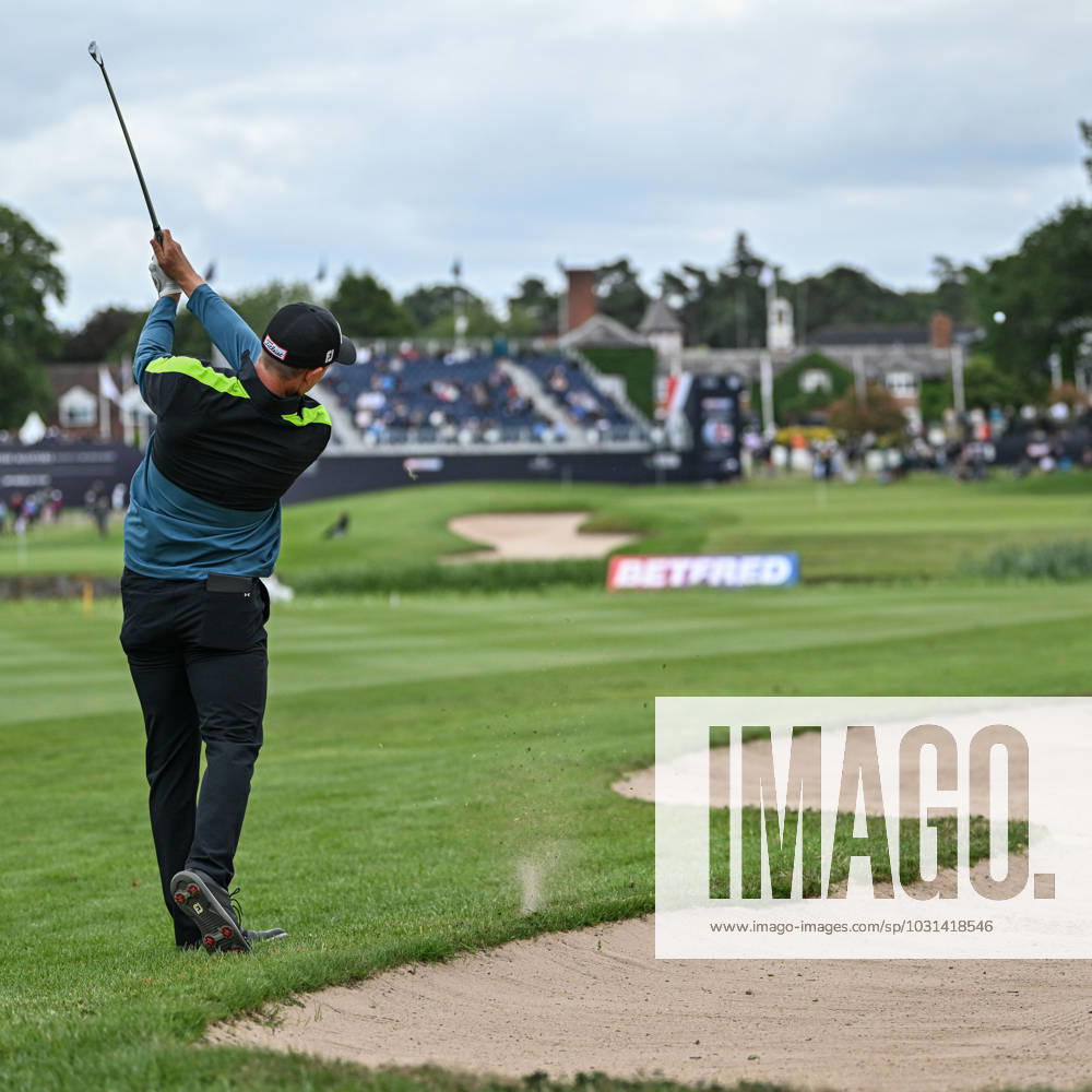 2nd July 2023; The Belfry, Sutton Coldfield, West Midlands, England: Betfred British Masters Golf, Day 4; Grant Forrest hits a long iron to the 18th green from the edge of the bunker ActionPlus12526233 GodfreyxPitt