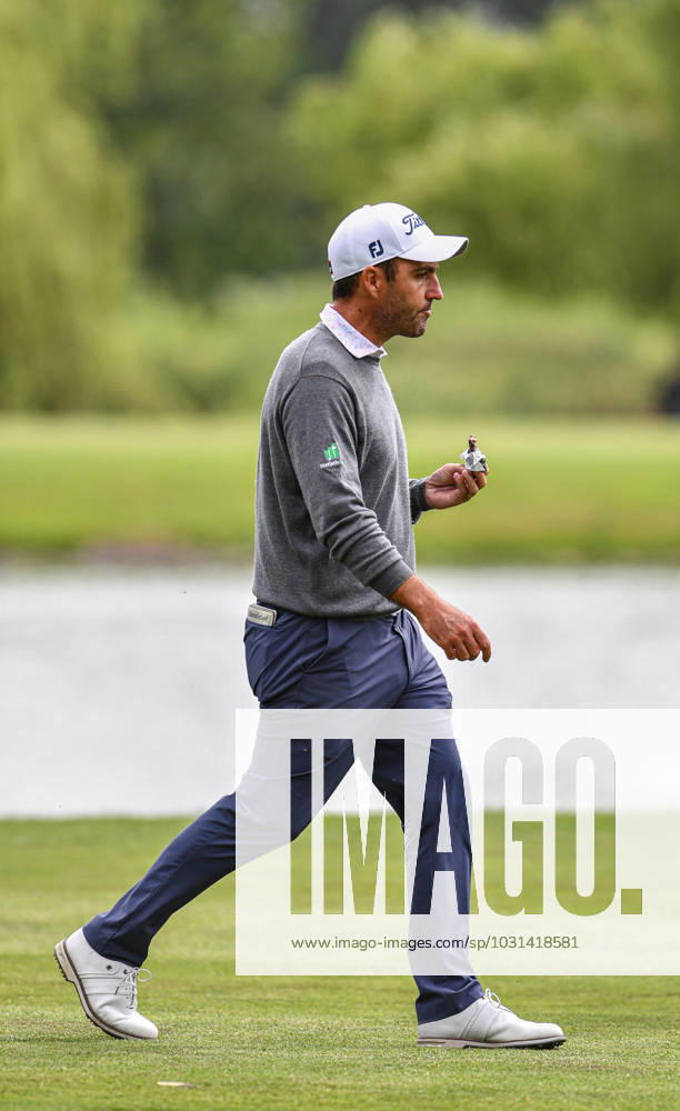 2nd July 2023; The Belfry, Sutton Coldfield, West Midlands, England: Betfred British Masters Golf, Day 4; Edoardo Molinari takes a snack during his round ActionPlus12526195 GodfreyxPitt