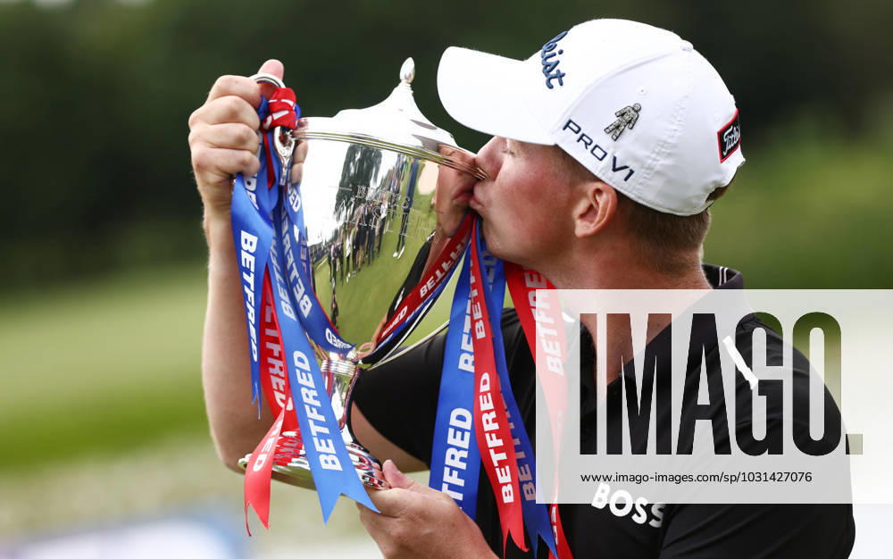 Mandatory Credit: Photo by James Marsh Shutterstock (13987427bn) Daniel Hillier of New Zealand celebrates with the trophy after winning the tournament. Betfred British Masters, Day Four, Golf, The Belfry Golf Club, Sutton Coldfield, UK - 02 Jul 2023 Betfred British Masters, Day Four, Golf, The Belfry Golf Club, Sutton Coldfield, UK - 02 Jul 2023