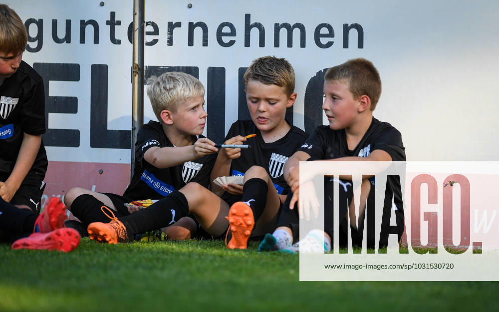 Football, 2023 2024 season, regional friendly, 07 07 2023, men, 1 FC Bocholt black vs MSV Duisburg red children at gang Bocholt Stadion am Huenting North Rhine Westphalia Germany 230707_fb_1fc-bocholt_msv-duisburg_19648