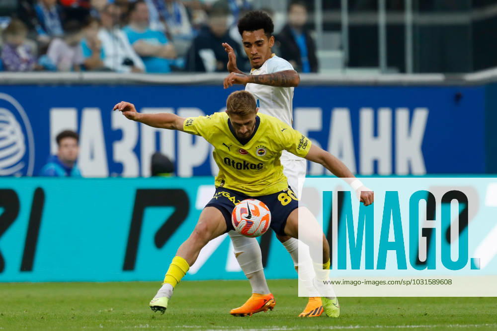 Zenit St. Petersburg v Fenerbahce SK - Pari Match Premier Du Queiroz (top) of Zenit St. Petersburg and Ismail Yuksek of Fenerbahce vie for the ball during the Pari Match Premier tournament match between FC Zenit Saint Petersburg and Fenerbahce SK on July 9, 2023 at Gazprom Arena in Saint Petersburg, Russia. Saint Petersburg Russia