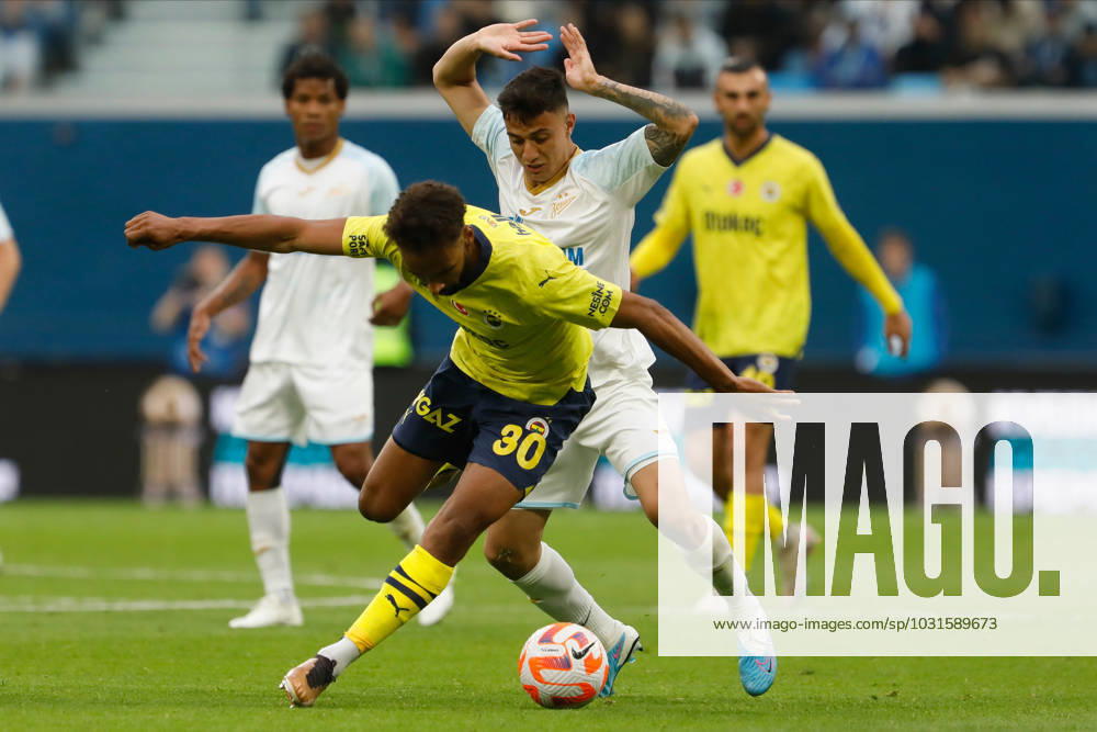 Zenit St. Petersburg v Fenerbahce SK - Pari Match Premier Gustavo Mantuan of Zenit St. Petersburg and Nazim Sangare (in front) of Fenerbahce vie for the ball during the Pari Match Premier tournament match between FC Zenit Saint Petersburg and Fenerbahce SK on July 9, 2023 at Gazprom Arena in Saint Petersburg, Russia. Saint Petersburg Russia