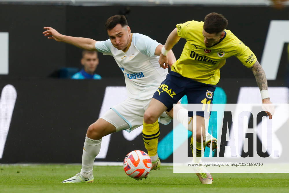 Zenit St. Petersburg v Fenerbahce SK - Pari Match Premier Vyacheslav Karavaev (L) of Zenit St. Petersburg and Ryan Kent of Fenerbahce vie for the ball during the Pari Match Premier tournament match between FC Zenit Saint Petersburg and Fenerbahce SK on July 9, 2023 at Gazprom Arena in Saint Petersburg, Russia. Saint Petersburg Russia