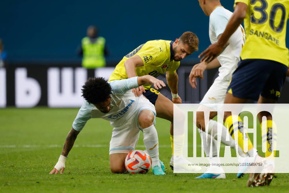 Zenit St. Petersburg v Fenerbahce SK - Pari Match Premier Claudinho (L) of Zenit St. Petersburg and Ismail Yuksek of Fenerbahce vie for the ball during the Pari Match Premier tournament match between FC Zenit Saint Petersburg and Fenerbahce SK on July 9, 2023 at Gazprom Arena in Saint Petersburg, Russia. Saint Petersburg Russia