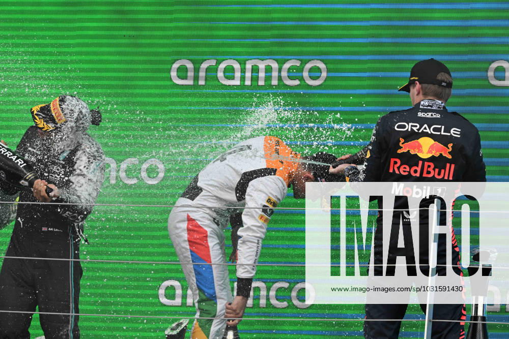9th July 2023: Silverstone Circuit, Northamptonshire, England: Formula 1 2023 Aramco British F1 Grand Prix: Race Day; Max Verstappen of the Red Bull Racing team, , Lando Norris of the McLaren-Mercedes team and Lewis Hamilton of the Mercedes team spray each other with Champagne on the podium ActionPlus12529489 SimonxWest Content restricted for UK based newspaper