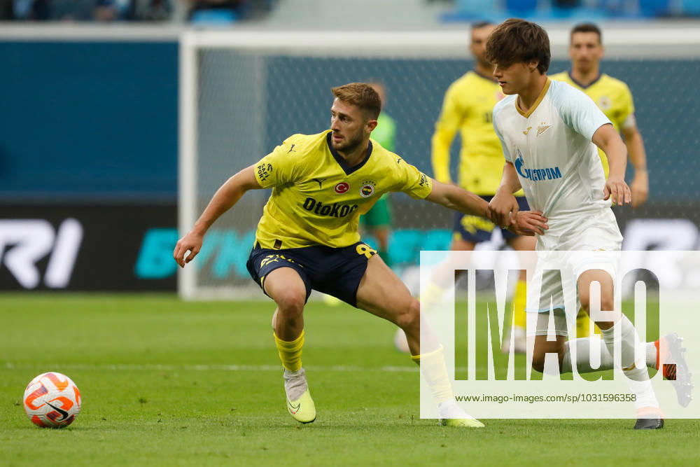 Zenit St. Petersburg v Fenerbahce SK - Pari Match Premier Dmitry Vasiliev (R) of Zenit St. Petersburg and Ismail Yuksek of Fenerbahce vie for the ball during the Pari Match Premier tournament match between FC Zenit Saint Petersburg and Fenerbahce SK on July 9, 2023 at Gazprom Arena in Saint Petersburg, Russia. Saint Petersburg Russia