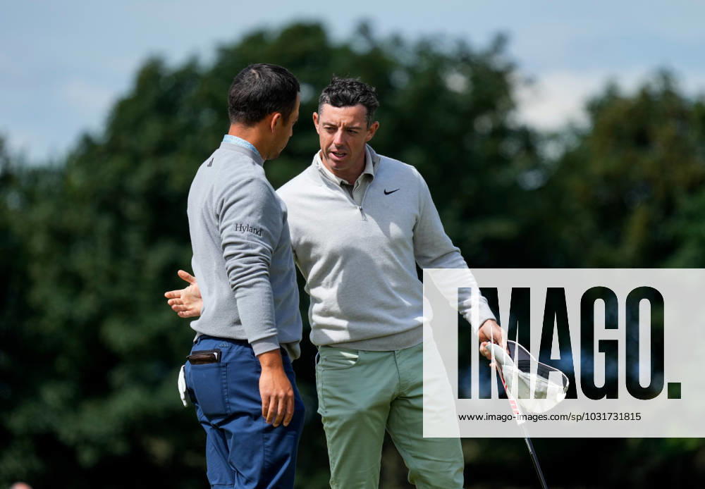 Mandatory Credit: Photo by Stuart Wallace Shutterstock (14003893o) Rory McIlroy with Xander Schauffele after finishing their first round game on the 9th green. Genesis Scottish Open, Day One, Golf, The Renaissance Club, North Berwick, UK - 13 Jul 2023 Genesis Scottish Open, Day One, Golf, The Renaissance Club, North Berwick, UK - 13 Jul 2023