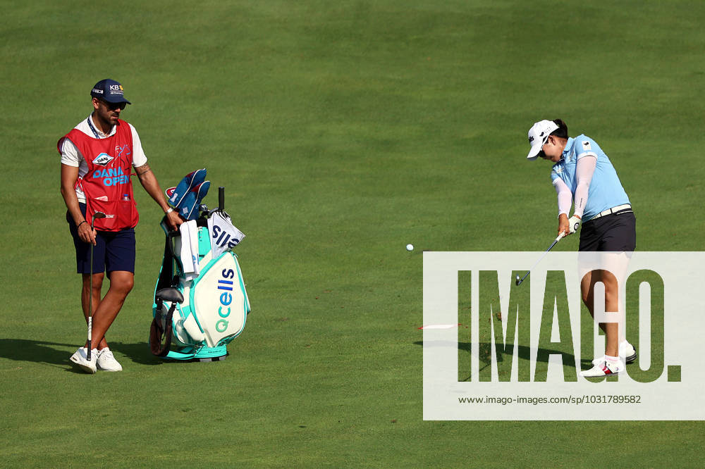 DANA Open A Lim Kim of Kimpo, Republic of Korea hits from the 18th fairway to the green as her caddy looks on during the second round of the Dana Open golf tournament at Highland Meadows Golf Club in Sylvania, Ohio USA, on Friday, July 14, 2023. Sylvania Ohio United States