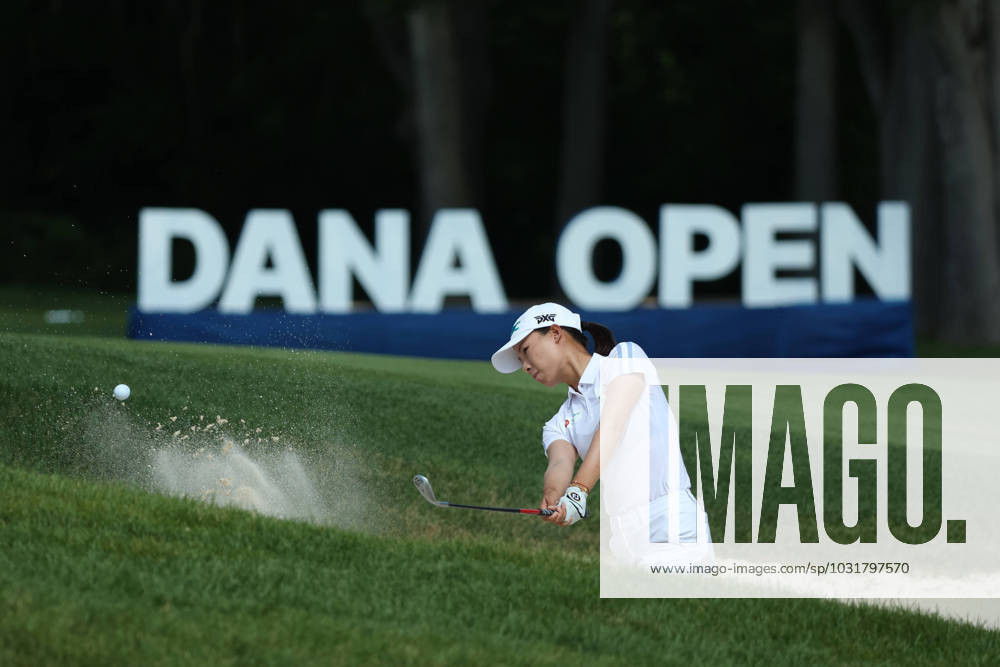 KW28 Dana Open Yu-Sang Hou of Chinese Taipei blasts out of the sand trap toward the 18th green during Day Two of the Dana Open at Highland Meadows Golf Club in Sylvania, Ohio USA, on Friday, July 14, 2023. Sylvania Ohio United States