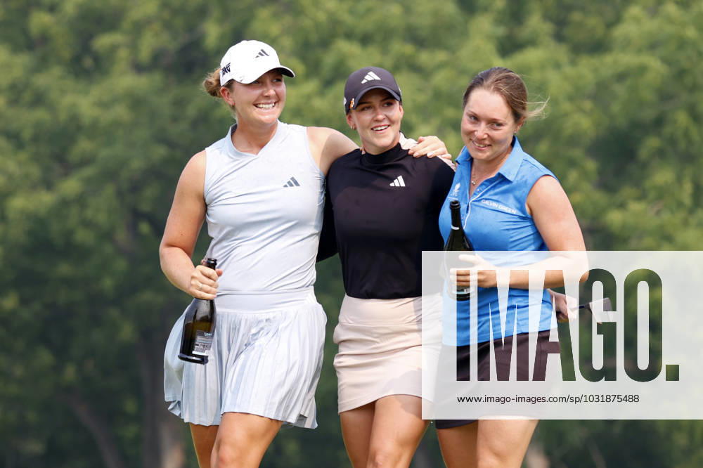 SYLVANIA, OH - JULY 16: LPGA, Golf Damen golfer Linn Grant is congratulated on the 18th green by LPGA players from Sweden, Linnea Strom in white hat and Linnea Johansson in blue sleeveless shirt after winning the Dana Open on July 16, 2023, at Highland Meadows Golf Club in Sylvania, Ohio. (Photo by Brian Spurlock Icon Sportswire) GOLF: JUL 16 LPGA Dana Open Icon230716185