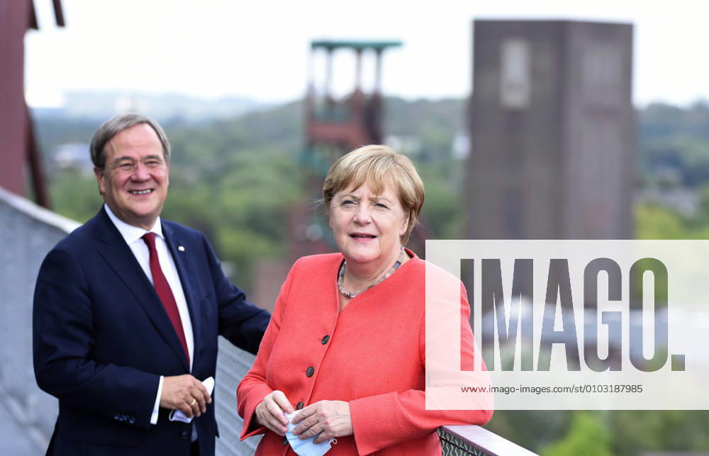 Ruhr Konferenz BUNDESKANZLERIN DR ANGELA MERKEL visits the federal state of North Rhine-Westphalia NRW ,at the Zeche Zollverein in Essen,city in the Ruhr area,the Chancellor and Prime Minister Armin Laschet on the terrace in front of the Erich Brost Pavillion at Zeche Zollverein,photographed on 18 08 2020 Â