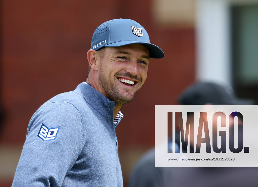 17th July 2023; Royal Liverpool Golf Club, Hoylake, Merseyside, England: The Open Championship Practice Day; Bryson Dechambeau (USA) smiles as he practices on the putting green in front of the clubhouse ActionPlus12532358 DavidxBlunsden
