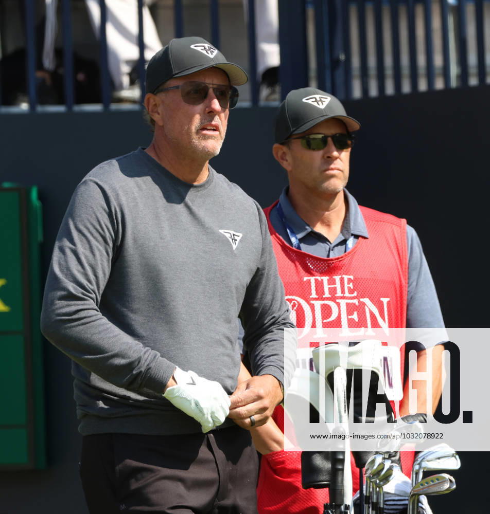 American Phil Mickelson and his caddie on the 1st tee on the first day at the 151st Open Championship at Royal Liverpool Golf Club in Hoylake, England on Thursday, July 20, 2023. LON2023072092f HUGOxPHILPOTT