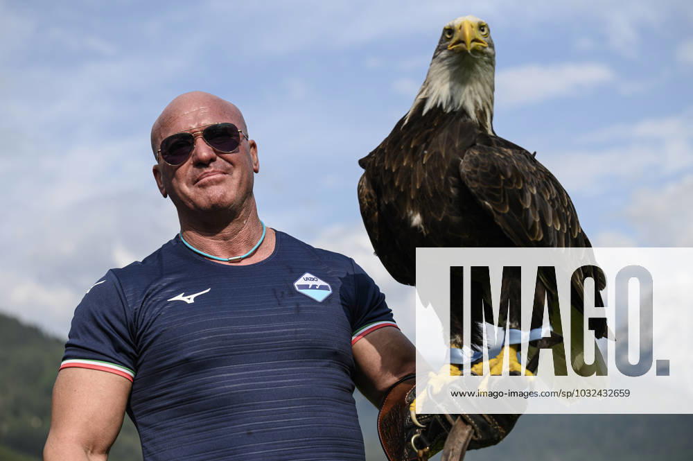 SS Lazio v US Triestina - Friendly The SS Lazio s mascotte eagle Olympia with trainer Juan Bernabe is seen prior to the pre-season friendly football match between SS Lazio and US Triestina. Auronzo di Cadore Italy