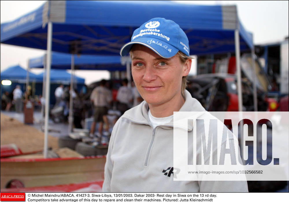 41427 03 Michel Maindru ABACA. 41427-3. Siwa-Libya, 13 01 2003. Dakar 2003- Rest day in Siwa on the 13 rd day. Competitors take advantage of this day to repare and clean their machines. Pictured: Jutta Kleinschmidt