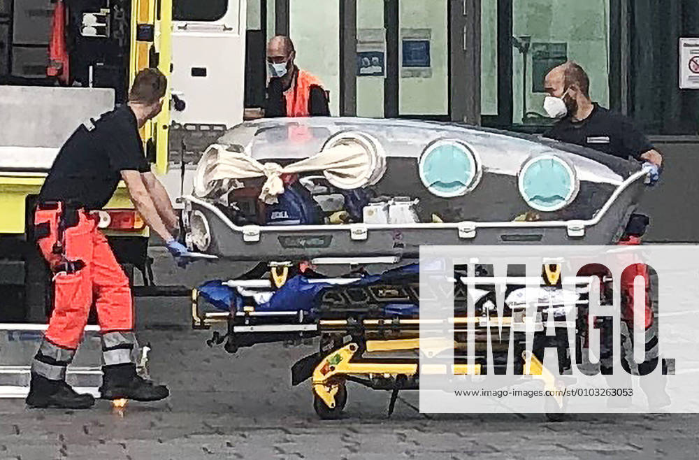 KW34 BERLIN, GERMANY - AUGUST 22, 2020: Members of staff handle an isolation capsule outside the emergency department of the Charite hospital where Russian opposition activist Alexei Navalny has been transferred from Russia s Omsk Emergency Hospital No 1. Head of the Anti-Corruption Foundation (FBK), Navalny felt bad aboard a passenger plane from Tomsk to Moscow on August 20, was brought to hospital in Omsk with poisoning symptoms and placed in an induced coma. Vyacheslav Filippov TASS TS0E435F
