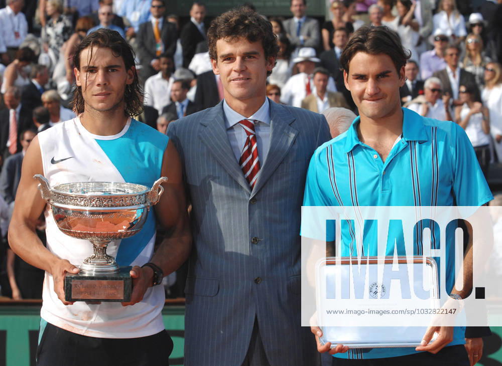 Rafael Nadal Wins the French Open - Paris Spain s Rafael Nadal (L) with his Philippe Chatrier Trophy and Switzerland s Roger Federer (R) pose with former winner Gustavo Kuerten (C) after the Men s Singles Final at the Roland Garros stadium in Paris, France, on June 10, 2007. Nadal won 6-3, 4-6, 6-3, 6-4. Photo by Gorassini-Gouhier-Guibbaud-Guignebourg Cameleon ABACAPRESS.COM Paris France