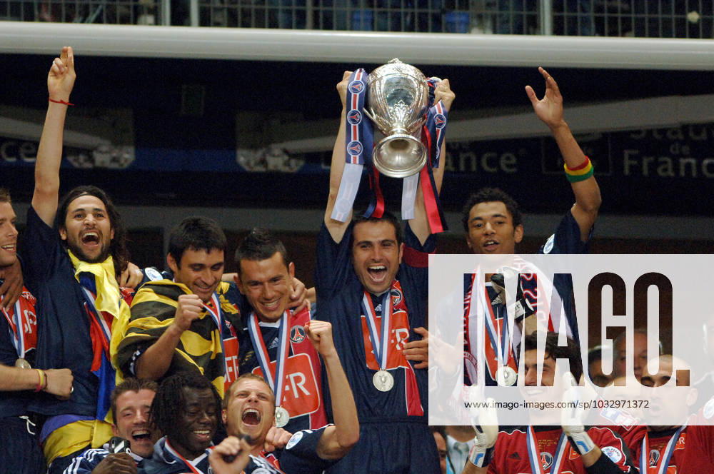 Files PSG s Pedro Miguel Pauleta jubilates with the trophy and his team mate after winning the Soccer French Cup Final, Paris-Saint-Germain vs Olympique de Marseille at the Stade de France in Saint-Denis, near Paris, France, on April 29, 2006. Paris-Saint-Germain won 2-1. Photo by Christophe Guibbaud Cameleon ABACAPRESS.COM Paris France