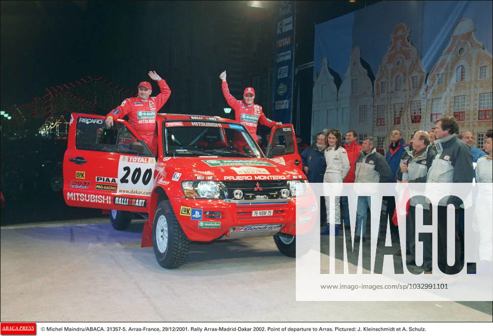 31357 05 Michel Maindru ABACA. 31357-5. Arras-France, 29 12 2001. Rally Arras-Madrid-Dakar 2002. Point of departure to Arras. Pictured: Jutta Kleinschmidt et Andreas Schulz.