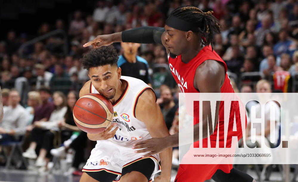Maodo Lo GER , Luguentz Dort duel game scene action sports basketball DBB national team men international match season 2023 2024 09 08 2023 Germany GER vs Canada CAN