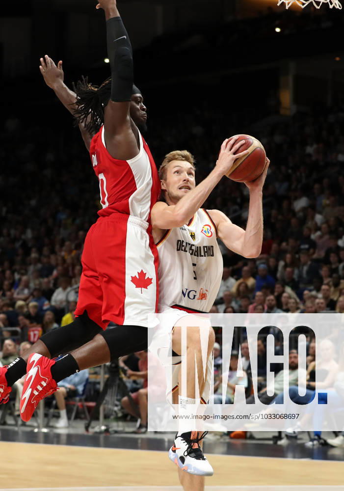 Luguentz Dort, Niels Giffey GER duel game scene action sport basketball DBB national team men international match season 2023 2024 09 08 2023 Germany GER vs Canada CAN