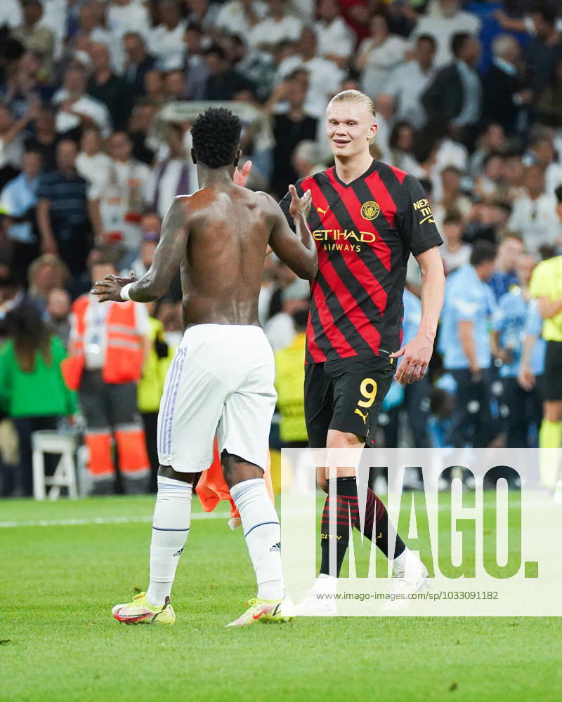 Real Madrid CF v Manchester City FC - Champions League MADRID, SPAIN, MAY 9: Erling Haaland and Vinicius Jr greet each other at the end of the game during the 1st leg Champions League Semifinals match between Real Madrid CF and Manchester City FC at Estadio Santiago Bernabà u on May 9, 2023 in Madrid, Spain. Madrid Santiago Bernabà u Madrid Spain