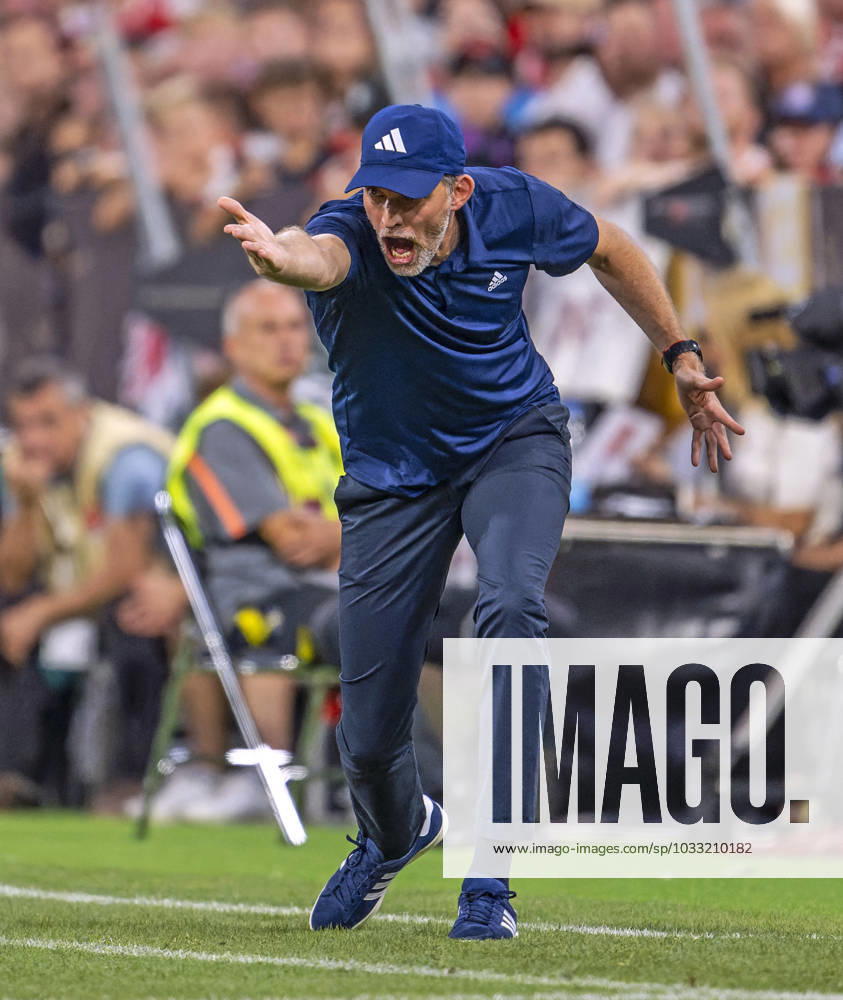 Football 1 Bundesliga 2023 2024, Supercup Final 2023 FC Bayern Munich RB Leipzig, at Allianz Arena Munich Coach Thomas Tuchel FC Bayern Munich in a rage, frantically gives instructions to his players on the sidelines DFL and DFB regulations prohibit any use of photographs as image sequences and or quasi video