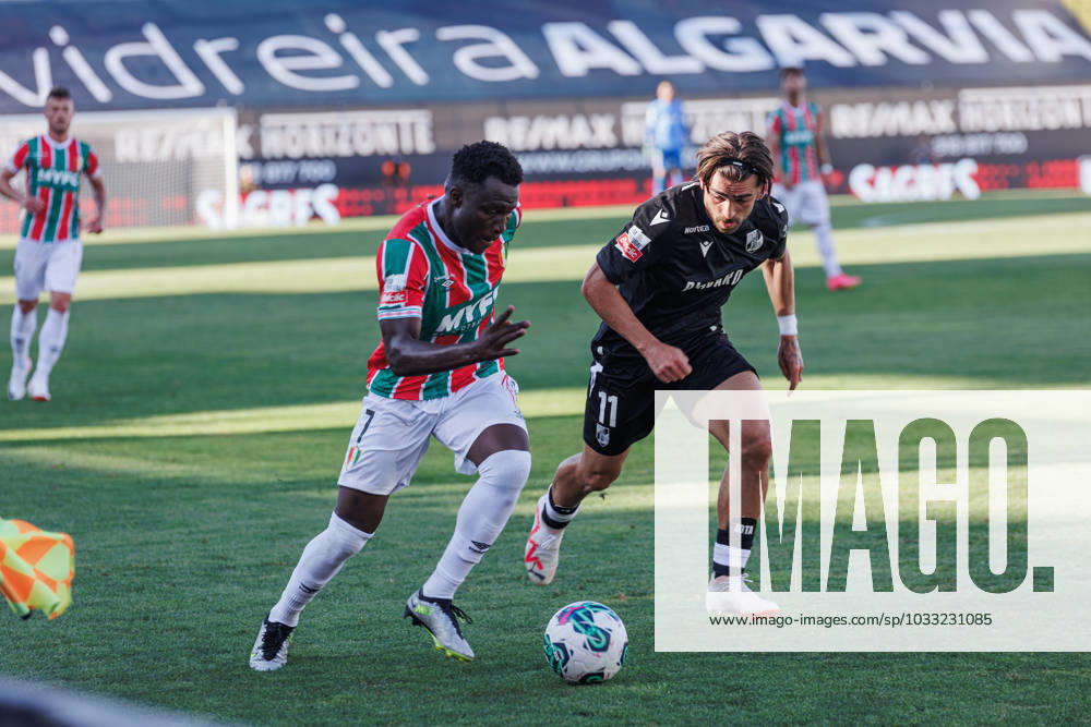 Regis Ndo in a duel with Jota Silva during Liga Portugal 23 24 game between CF Estrela Amadora and Vitoria SC at Estadio Jose Gomes, Amadora, Lisbon, Portugal. (Maciej Rogowski) Lisbon Estadio Jose Gomes Portugal