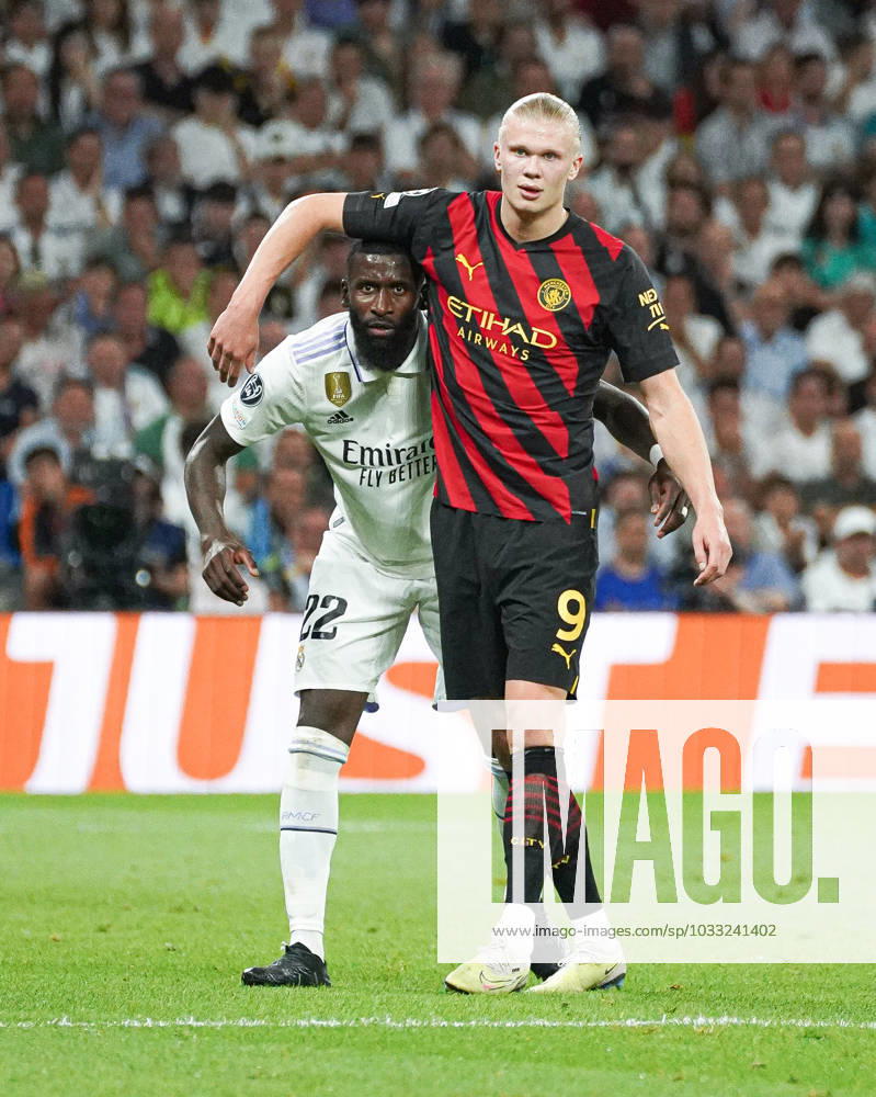 Real Madrid CF v Manchester City FC - Champions League MADRID, SPAIN, MAY 9: Antonio Rüdiger and Erling Haaland disputing a ball during the 1st leg Champions League Semifinals match between Real Madrid CF and Manchester City FC at Estadio Santiago Bernabeu on May 9, 2023 in Madrid, Spain. Madrid Santiago Bernabeu Madrid Spain