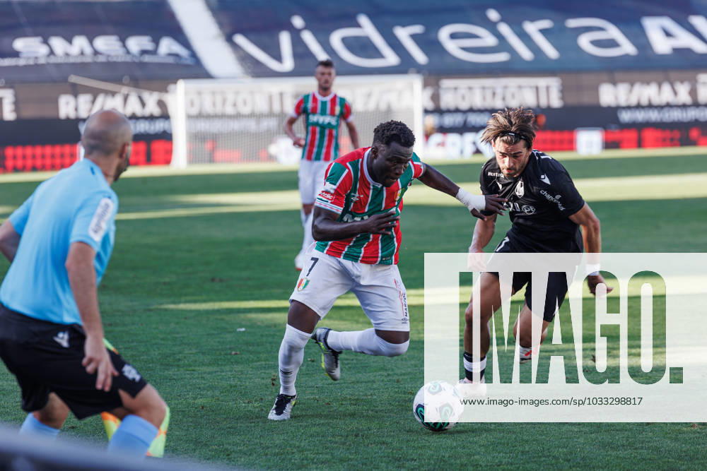 Regis Nod in a duel with Jota Silva during Liga Portugal 23 24 game between CF Estrela Amadora and Vitoria SC at Estadio Jose Gomes, Amadora, Lisbon, Portugal. (Maciej Rogowski) Lisbon Estadio Jose Gomes Portugal