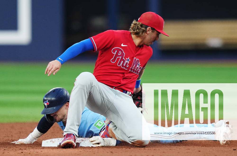 Toronto Blue Jays Cavan Biggio (left) steals second base ahead of the tag from Philadelphia Phillies second baseman Bryson Stott (5) during second inning MLB, Baseball Herren, USA interleague baseball action in Toronto on Wednesday, August 16, 2023. Canada News - August 16, 2023 - ZUMAc35_ 20230816_zaf_c35_095