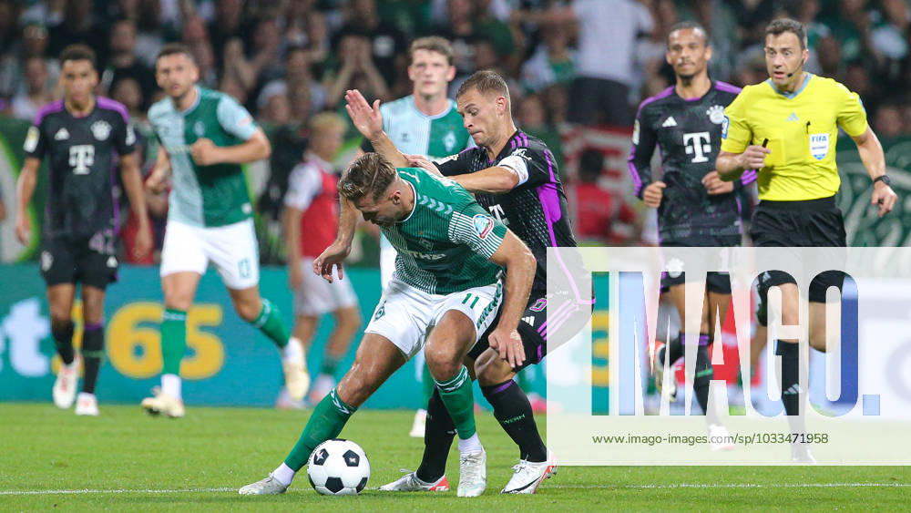 F l Niclas Füllkrug SV Werder Bremen, 11 and Joshua Kimmich FC Bayern Munich, 6 in duel, duel, dynamics, action, game scene, THE DFL DIRECTIVES PROHIBIT ANY USE OF PHOTOGRAPHS AS IMAGE SEQUENCES AND OR VIDEOA HNUAL PHOTOSTRACKS DFL REGULATES PROHIBIT ANY USE OF PHOTOGRAPHS AS IMAGE SEQUENCES AND OR QUASI VIDEO , 18 08 2023, Bremen Germany , Football, Bundesliga, SV Werder Bremen FC Bayern Munich
