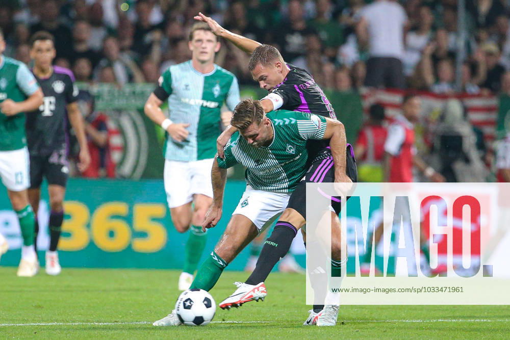 F l Niclas Füllkrug SV Werder Bremen, 11 and Joshua Kimmich FC Bayern Munich, 6 in duel, duel, dynamics, action, game scene, THE DFL DIRECTIVES PROHIBIT ANY USE OF PHOTOGRAPHS AS IMAGE SEQUENCES AND OR VIDEOA HNUAL PHOTOSTRACKS DFL REGULATES PROHIBIT ANY USE OF PHOTOGRAPHS AS IMAGE SEQUENCES AND OR QUASI VIDEO , 18 08 2023, Bremen Germany , Football, Bundesliga, SV Werder Bremen FC Bayern Munich