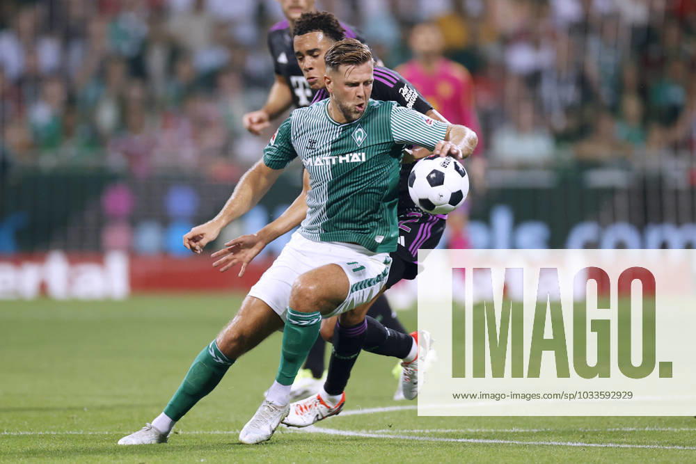 FUELLKRUG Niclas Team Werder Bremen with MUSIALA Jamal DFL Football Bundesliga Season 2023 2024 Match Werder Bremen FC Bayern Muenchen on 18 08 2023 in Bremen DFL REGULATIONS PROHIBIT ANY USE OF PHOTOGRAPHS as IMAGE SEQUENCES and or QUASI VIDEO