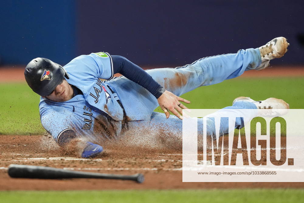Toronto Blue Jays catcher Danny Jansen (9) scores on a single by teammate center fielder Kevin Kiermaier during fifth inning MLB, Baseball Herren, USA interleague baseball action against the Washington Nationals in Toronto on Monday, August 28, 2023. Canada News - August 28, 2023 - ZUMAc35_ 20230828_zaf_c35_061