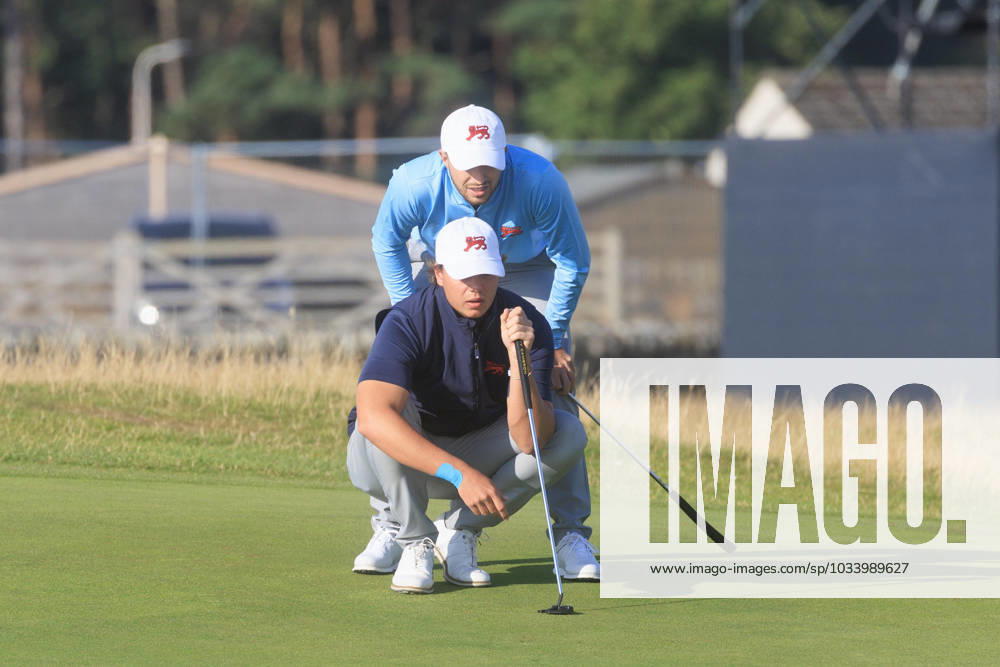 2nd September 2023; Old Course at St Andrews, St Andrews, Fife, Scotland; Walker Cup, Great Britain and Ireland versus USA, First Round; Alex Maguire and James Ashfield of Great Britain and Ireland line up a putt on the first green on the Old Course, St Andrews, during their foursomes match ActionPlus12549254 DavidxYoung
