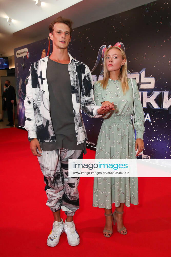 Actor Yevgeny Romantsov (L) and actress Viktoriya Agalakova attend the Moscow premiere of Dzhanik Fayziyev s fantasy film Cosmoball at the Karo 11 Oktyabr Cinema. Vyacheslav Prokofyev TASS TS0E4AB2