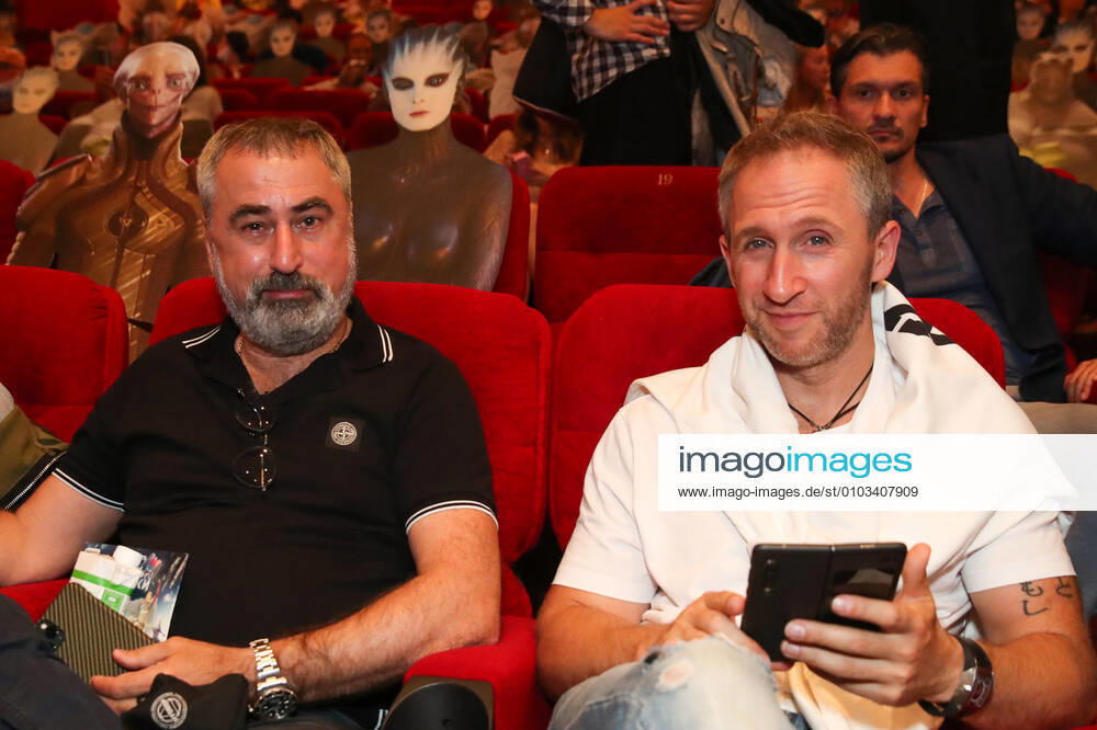 Alexander Tolmatsky (L) and actor Oskar Kuchera attend the Moscow premiere of Dzhanik Fayziyev s fantasy film Cosmoball at the Karo 11 Oktyabr Cinema. Vyacheslav Prokofyev TASS TS0E4ABD