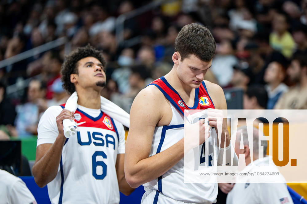 Basketball Manila Pasay 10 09 2023 FIBA Basketball World Cup 2023 Mens World Cup Match for 3rd Place Bronze United States of America USA Canada CAN WALKER KESSLER USA, No 14 CAMERON JOHNSON USA, No 06 knocked down