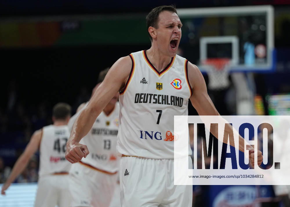 (230910) -- MANILA, Sept. 10, 2023 -- Johannes Voigtmann of Germany celebrates during the final between Germany and Serbia at the 2023 FIBA World Cup in Manila, the Philippines, Sept. 10, 2023. ) (SP)PHILIPPINES-MANILA-BASKETBALL-FIBA WORLD CUP-FINAL-GER VS SRB MengxYongmin